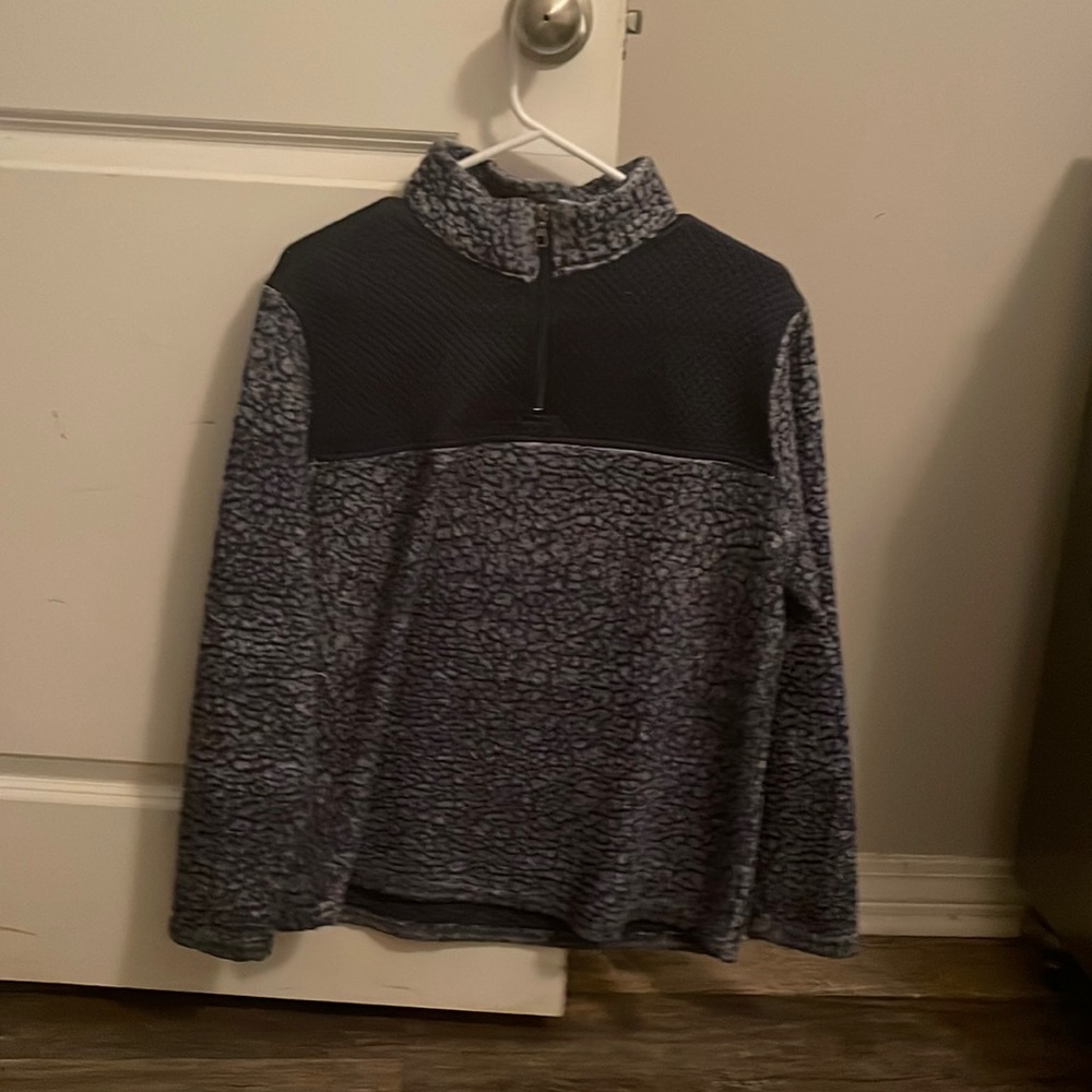 This is a furry navy blue with a little white athletic jacket!
